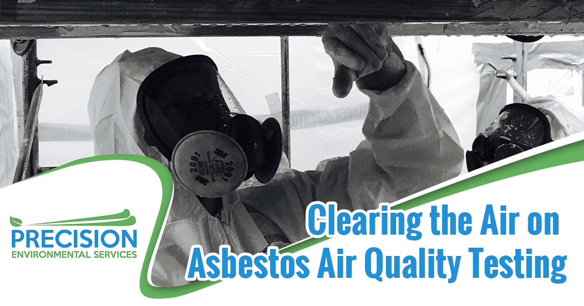 Image of men in a hazmat suits and face masks working. Clearing the air on asbestos air quality testing text is overlaid on a white background on the right hand side of the image. Asbestos air quality testing is a process used to determine the presence of airborne asbestos fibers in a given space. The process typically involves collecting air samples from the environment, then analyzing them in a lab for the presence of asbestos fibers. Air sampling is the most accurate way to test for asbestos, as other methods such as bulk sampling (taking a physical sample of material) may not give a full picture of the asbestos levels in the air.