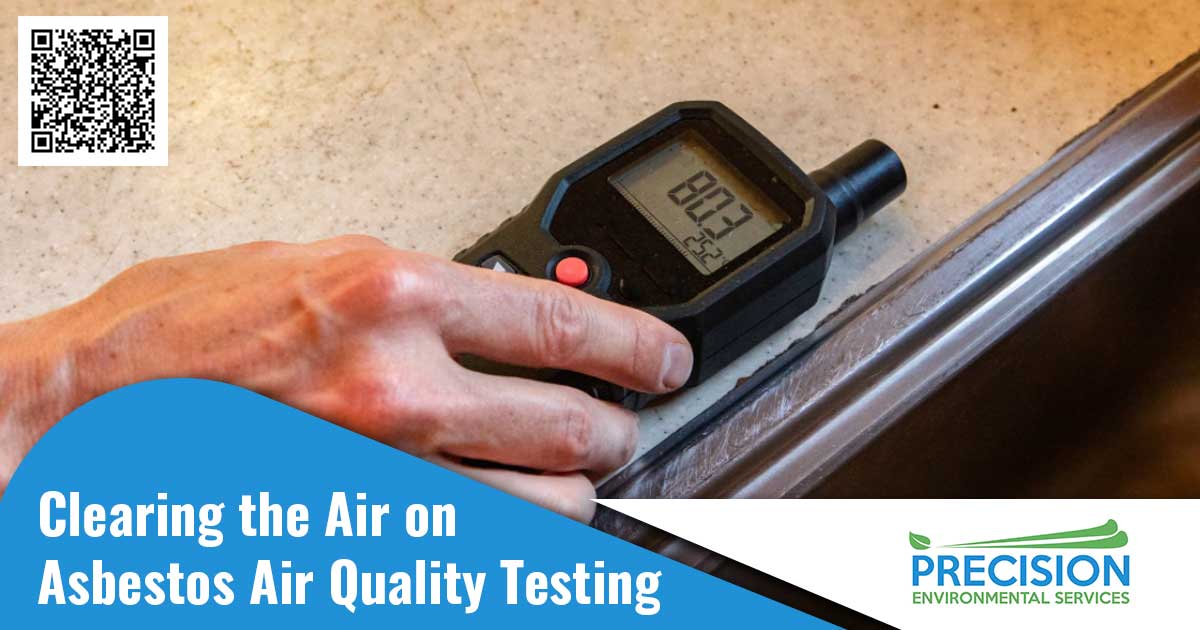 Image of a hand holding a air quality testing device on the edge of a table. Clearing the air on asbestos air quality testing text is overlaid on a blue background on the right side of the image. Asbestos air quality testing is an important test to determine the levels of asbestos in the air. Asbestos is a known carcinogen and long-term exposure can lead to a number of serious health problems, such as mesothelioma and asbestosis. Air quality testing can detect the presence of asbestos particles in the air and help identify areas in homes, offices, and public buildings that may be contaminated. This testing is important for ensuring safe air quality and protecting people from potential exposure to asbestos.